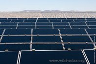 First Solar modules march across the desert as construction of the Agua Caliente Solar Project progresses